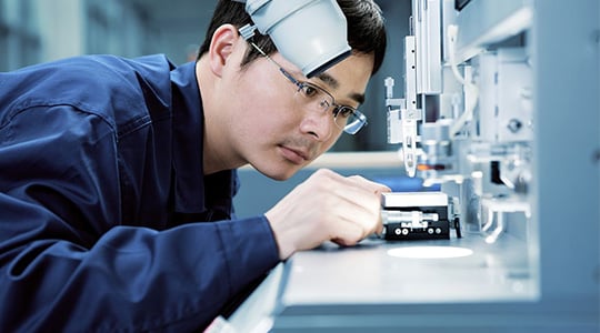 Engineer performing research using Keithley test equipment